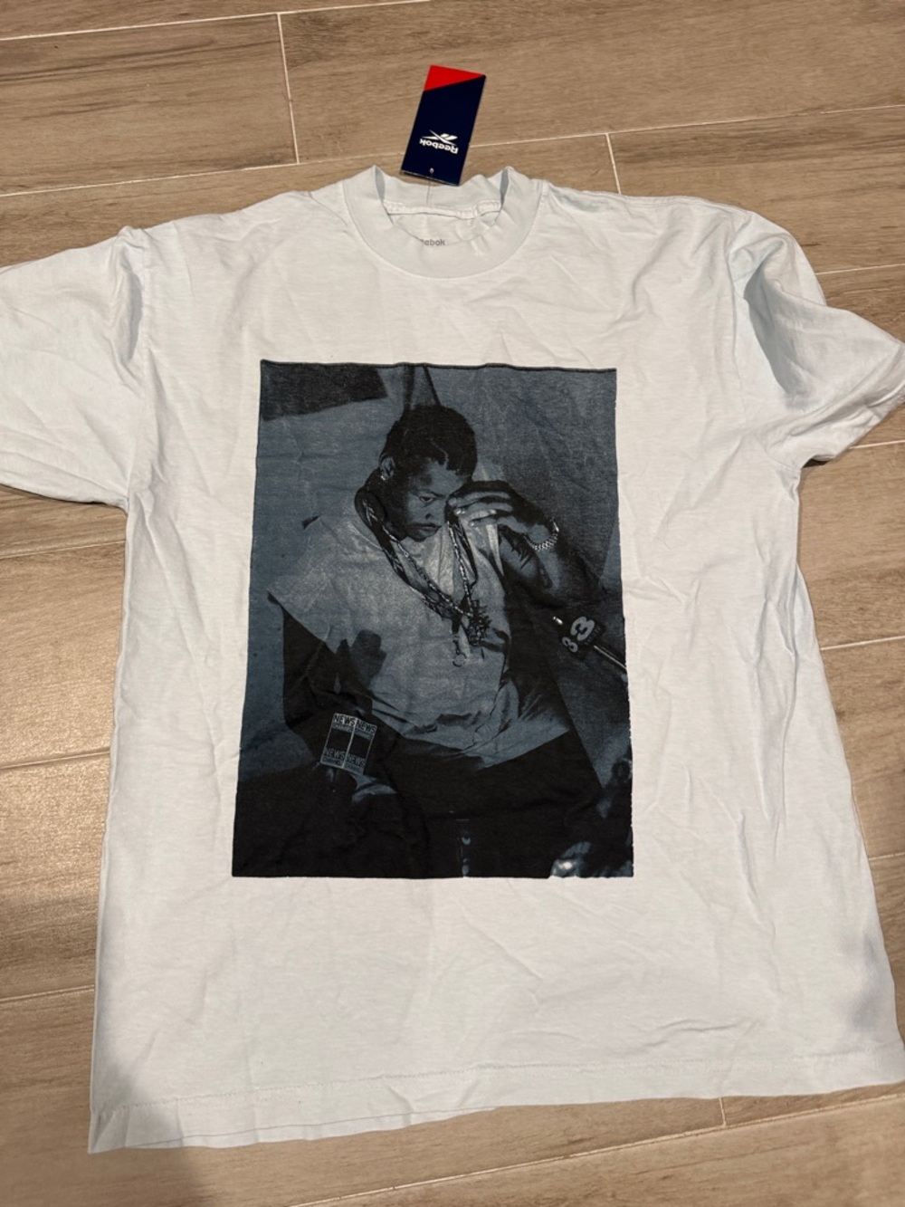 Reebok Men’s baby blue Short Sleeve Graphic Tee. Iverson graphic